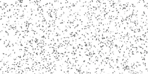 Abstract mosaic pattern in grayscale creating textured surface design with randomly scattered geometric shapes