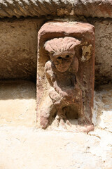 Romanesque corbel with human figure in El Salvador Church Pozancos Palencia