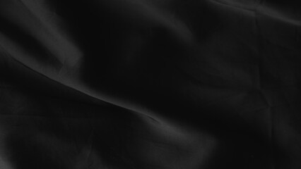 Bright hard light on shiny white silk background with elegant soft folds