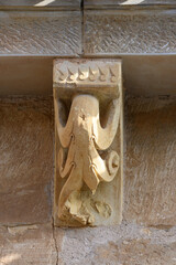 Romanesque corbel with abstract floral design in El Salvador Church Pozancos