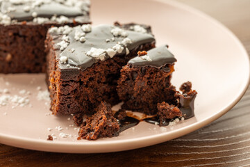Vegan chocolate brownie on plate close up