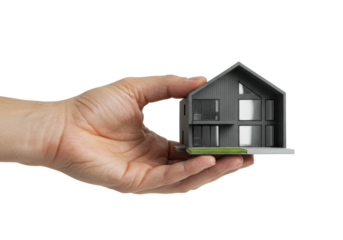 Caucasian adult hand holding modern minimalist house model. Cut out PNG