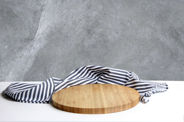  Wooden empty cutting board decorated with tablecloth., food advertisement vdisplay, showcase. Promotional template, backdrop