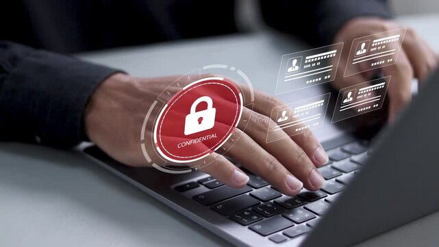 Employee confidentiality concept. Businessman use laptop with padlock icon and confidential word to access documents data and cyber security for managing corporate files and employee information.