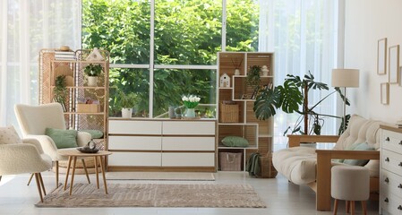 Stylish sofa and other furniture in living room. Interior design