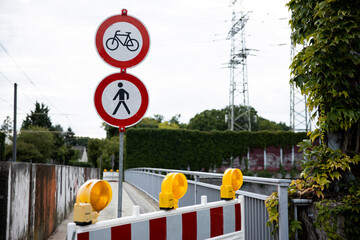 Roadwork scene with cones, barriers, and repair activity. Public infrastructure improvement in...
