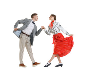 Happy couple in retro outfits dancing on white background
