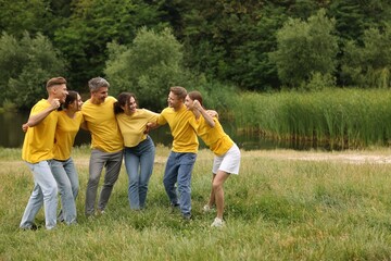 Team building. Group of happy people together outdoors