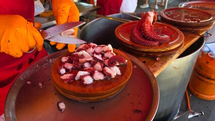 preparation of galician-style octopus, traditional fair