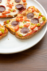 Italian bruschetta pizza made with toasted diet bread