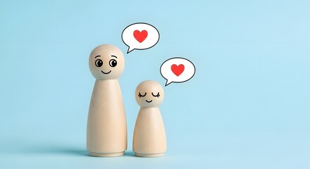 Wooden figures representing family love and connection, mother and child with heart icons