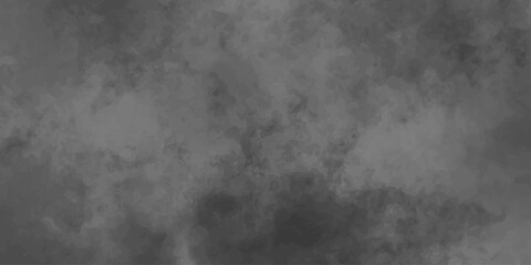 Obraz premium Dark and stormy clouds drift slowly across a grunge-textured black and white paper background