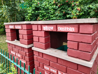 beautiful dustbin for wet garbage and dry garbage, made by concrete near park, ( written in English...