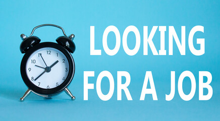 Looking for a job symbol. Beautiful blue background with alarm clock. Business and Looking for a...