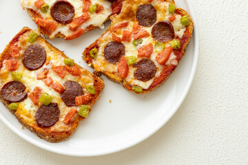 Italian bruschetta pizza made with toasted diet bread