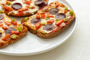 Italian bruschetta pizza made with toasted diet bread