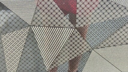 Abstract Triangular Mosaic with Graphic Motifs — Decorative Image for Packaging, Branding, Stylized Photography, Textile Design, and Digital Mockups