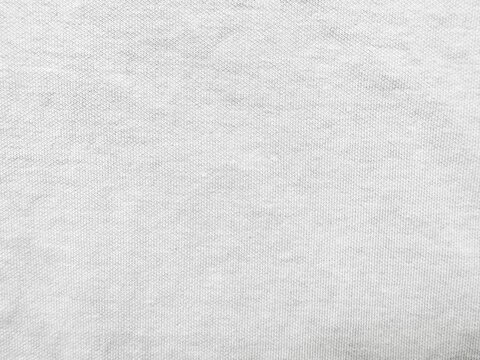 light gray cotton knit fabric texture closeup for apparel design mockup or minimalist textile background use


