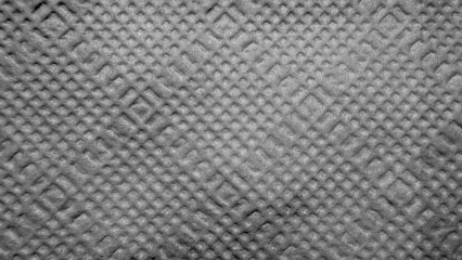 gray diamond embossed paper towel texture closeup for packaging design or household product...