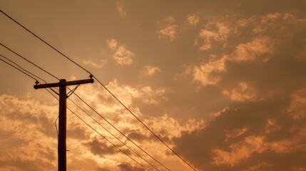A serene sunset sky with power lines silhouetting the horizon, capturing the beauty of nature and urban life.