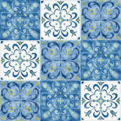 Colorful collage of traditional Mediterranean ceramic tiles with ornamental and floral patterns. Concept of vintage mosaic design, artistic heritage, and cultural expression in interior decor
