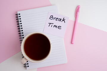 Coffee break time. Cup of coffee or tea on office desk. Business concept