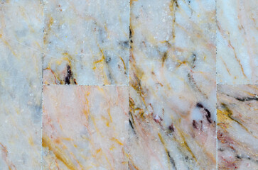 Glossy stone tile surface background with smooth polished texture and natural patterns