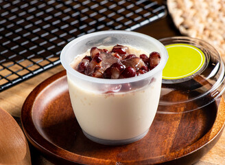 Red Bean Milk Pudding, a Sweet and Creamy Dessert in a Clear Cup side view of taiwan food
