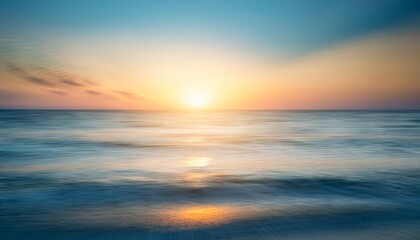 Fototapeta premium soft sunset over calm ocean dreamy pastel hues and blurry texture