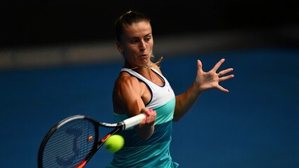 Intense tennis match action shot highlighting athletic skill and focus