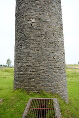 Magpie Mine, The Peak District, England - August 6 2025: View of weathered stone chimney and mine...