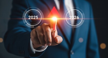 Businessman s finger touches glowing arrow symbolizing future growth and progress towards 2026 goals
