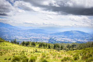 Pichincha Province, Quito, Ecuador - July 5, 2025: View of the valleys of southeastern Quito from...