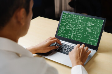Mathematic equations and modish formula on computer screen showing concept of science and education