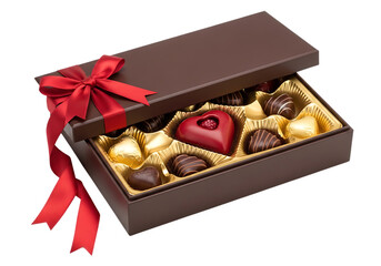 A box of assorted chocolates with a red ribbon on a black isolated background