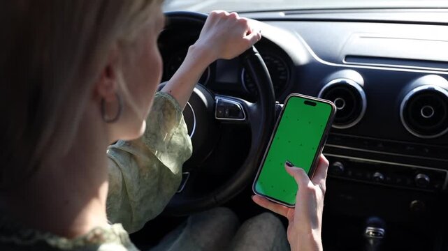 A Cautionary Scene: The Dangers of Using a Smartphone with a Green Screen While Driving a Car - Powered by Adobe