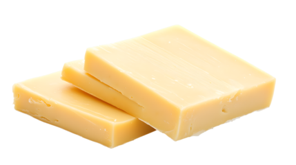 Three slices of yellow cheese on a white background. The cheese is cut into squares and is sitting on top of each other
