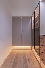 Nordic storage design:     wood doors combined with glass modules and pull-out drawers