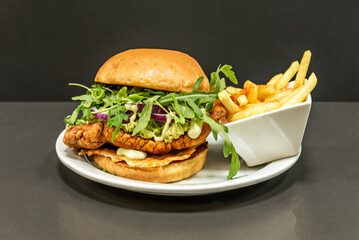 Quinoa Burger: Vegetable blend with carrots and purple potatoes baked with truffle oil