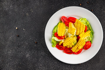 Corn salad tomato fresh vegetables snack fresh delicious gourmet food background on the table  rustic food top view copy space keto and paleo diet vegetarian and vegan food