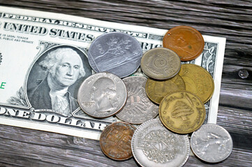 Pile of various coins from different countries from the world, vintage retro old coins with...