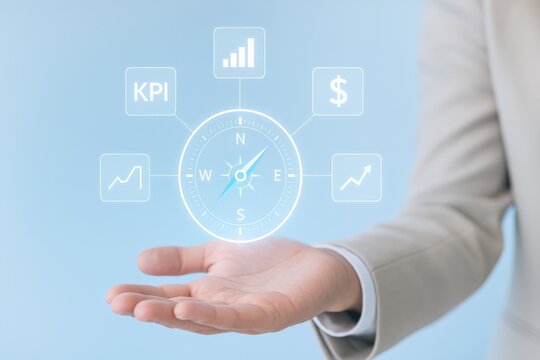 A Professional Hand Displaying Digital Metrics and Directional Insights for Business Performance and Strategy Optimization
