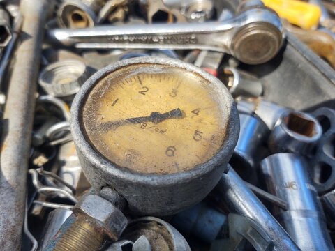 Vintage Pressure Gauge in Toolbox