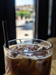 Close-up of iced orange coffee citrus cold brew in a glass