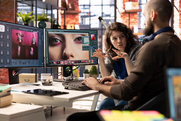 Photographers team collaborate on AI generated content using text to image tools. The editing...