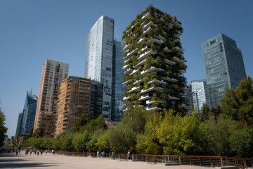 Fototapeta premium lush urban landscape featuring buildings with green facades and modern structures topped with green roofs