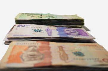 Concepts about Colombian money. Colombian pesos Banknotes background.