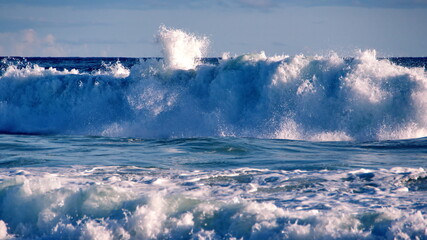 Waves breaking just off the beach in Zipolite, Mexico