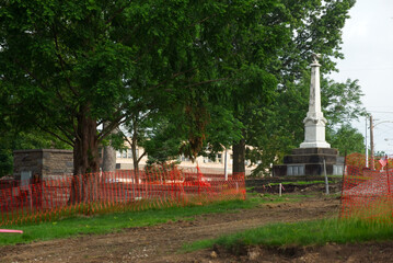 The Civil War monument on the town square in Twinsburg Ohio sits among construction fencing and torn-up grass in preparation for the square's renovation over the course of the summer.