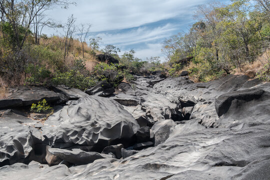 View of the typical rock formations of Vale da Lua, a unique landscape in Alto Para&iacute;so de Goi&aacute;s, Brazil. This area is known for its lunar-like rocks and natural pools.